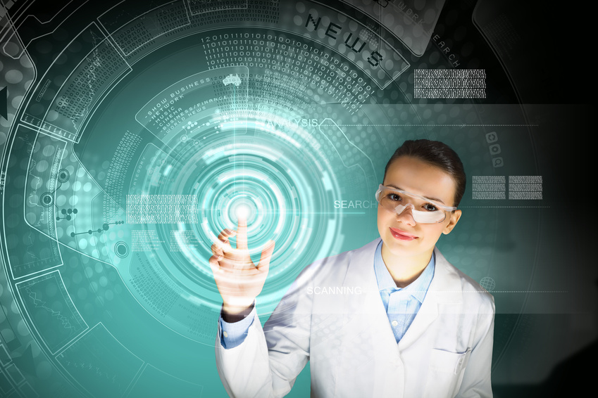 A female data dcientist in a lab coat with safety goggles